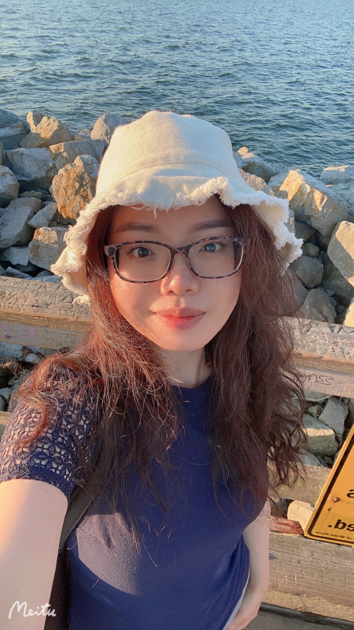 Jessica smiling by the water at White Rock